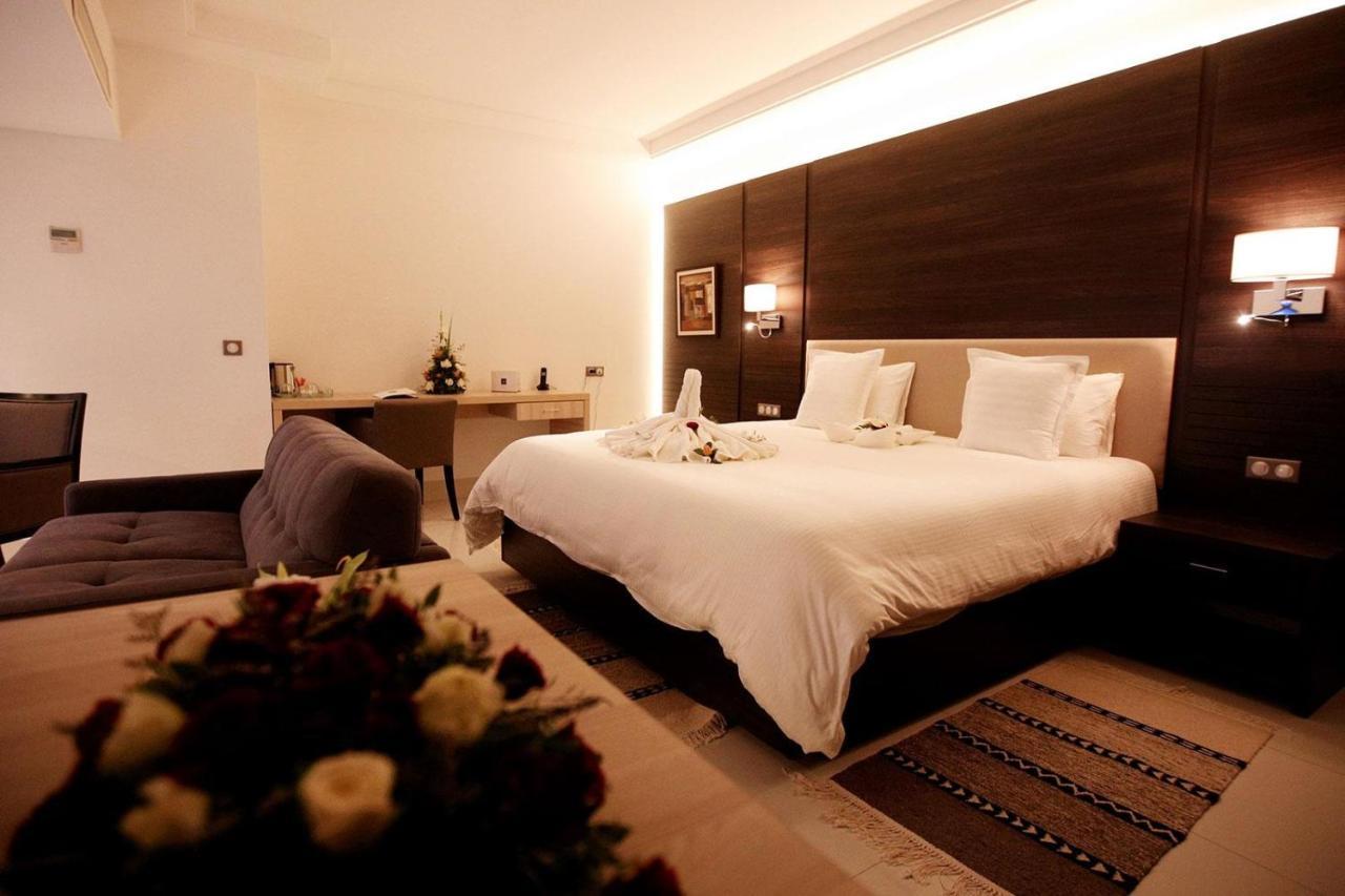 モーベンピック ホテル スファックス エクステリア 写真 A bedroom at the hotel