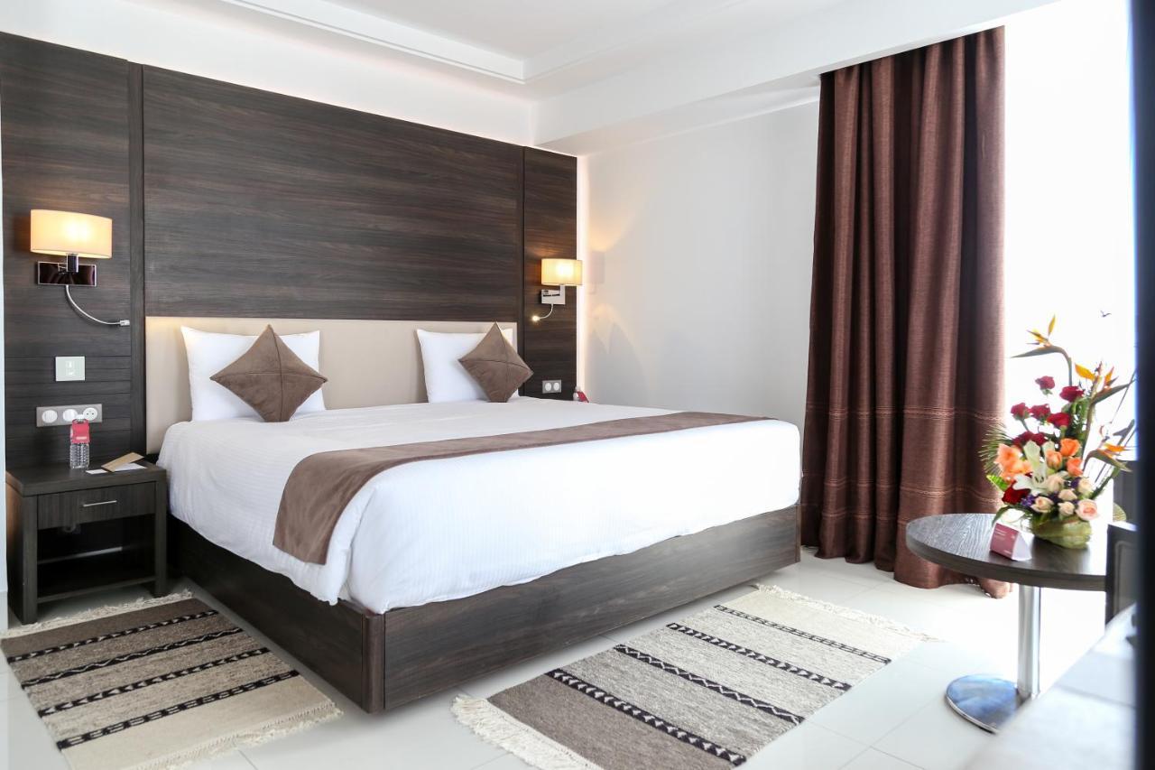 モーベンピック ホテル スファックス エクステリア 写真 A bedroom at the hotel